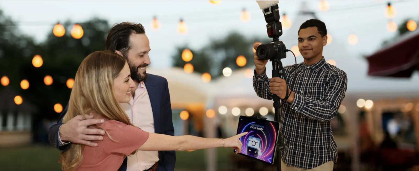 Roaming Photo Booth photographer capturing candid moments at a live event